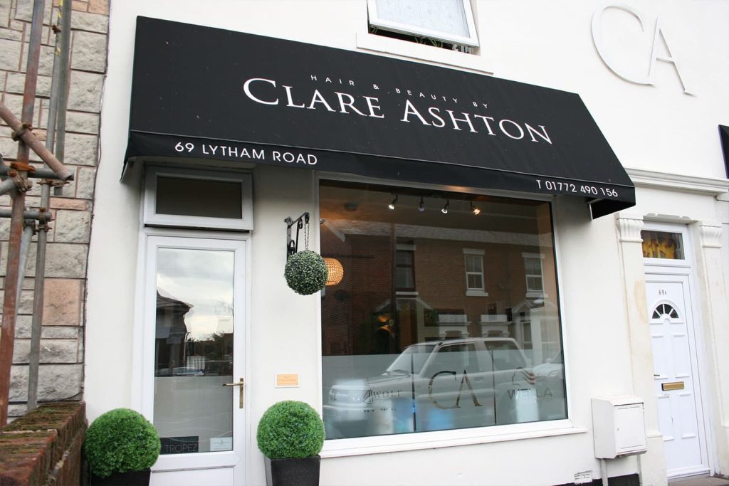 Clare Ashton Hair - wedge awnings with printed text brushed aluminium stand-off letters