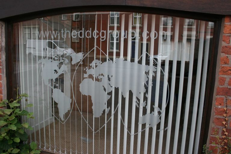 DDC Group - frosted etch effect contour cut window graphics.