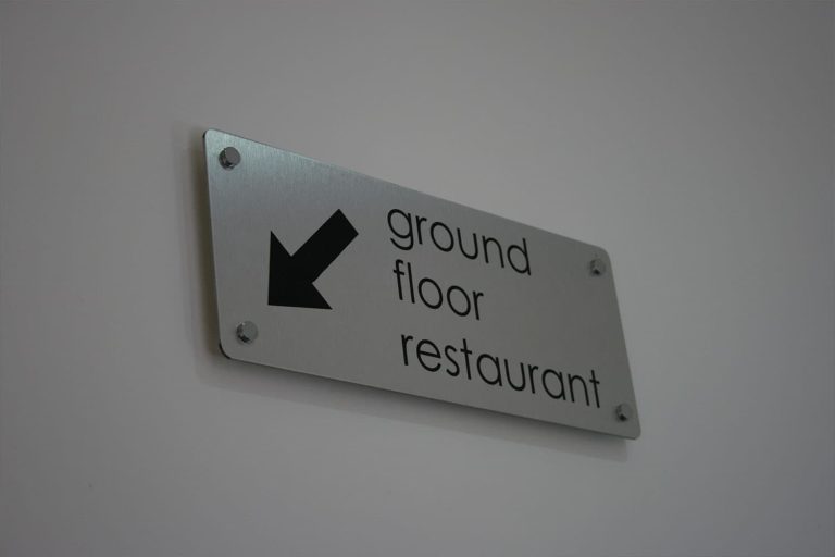 East Z East Liverpool - internal brushed ali-comp wayfinding plaque with polished chrome stand-off locators