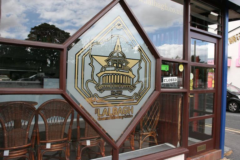 Lalbagh - frosted and gold vinyl design window graphics.