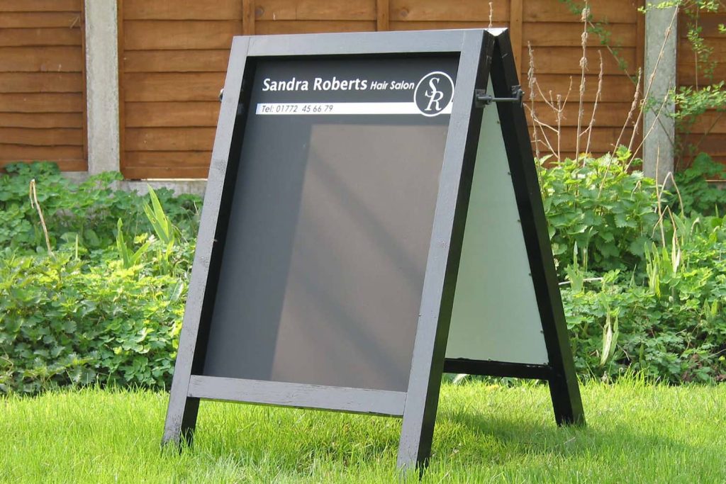 Sandra Roberts Hair Salon wooden chalk a-board
